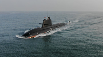 Submarine bears off port for maritime training drills