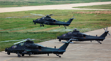 Attack helicopters lift off for flight training