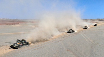 Main battle tanks rumble through mound of dusts