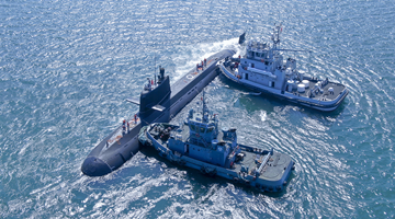 Submarine bears off port for maritime training